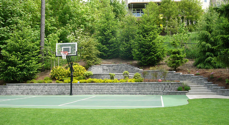 Patio hardscape with stairs and basketball court